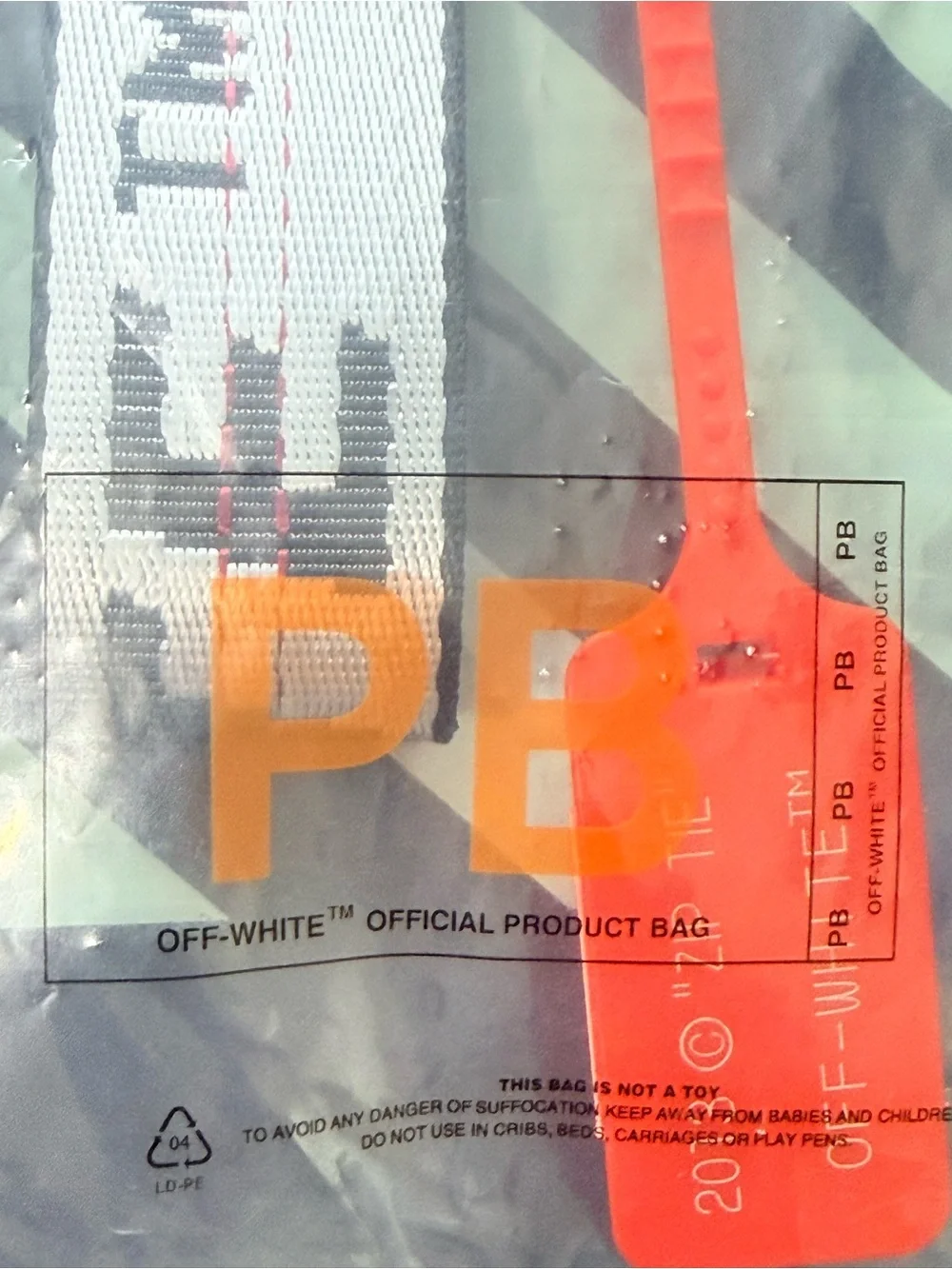 Off-White Black & White Logo Strap with Red Tag Accent